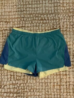 Eddie Bauer Women’s Large Cove Trail Shorts with Blue Panels and Yellow Trim